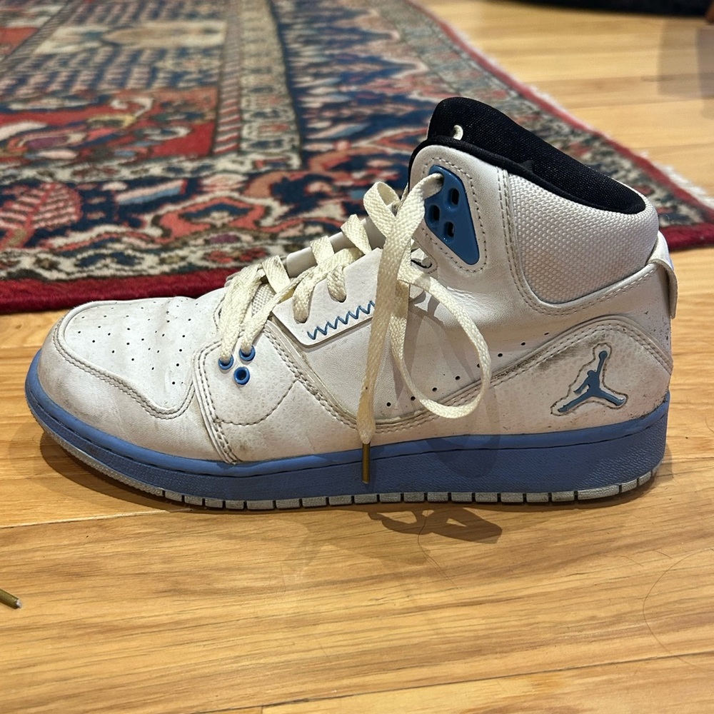 Jordans baby blue and white shoes. Size 6.5Y but would fit 7-8 women’s.